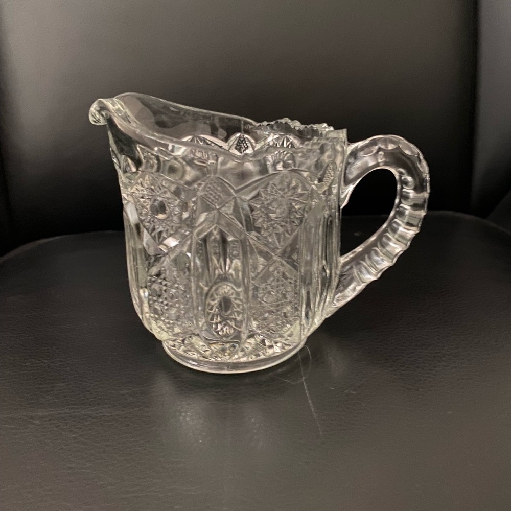 Elegant Clear cut glass creamer or gravy boat 4in tall 4 in wide